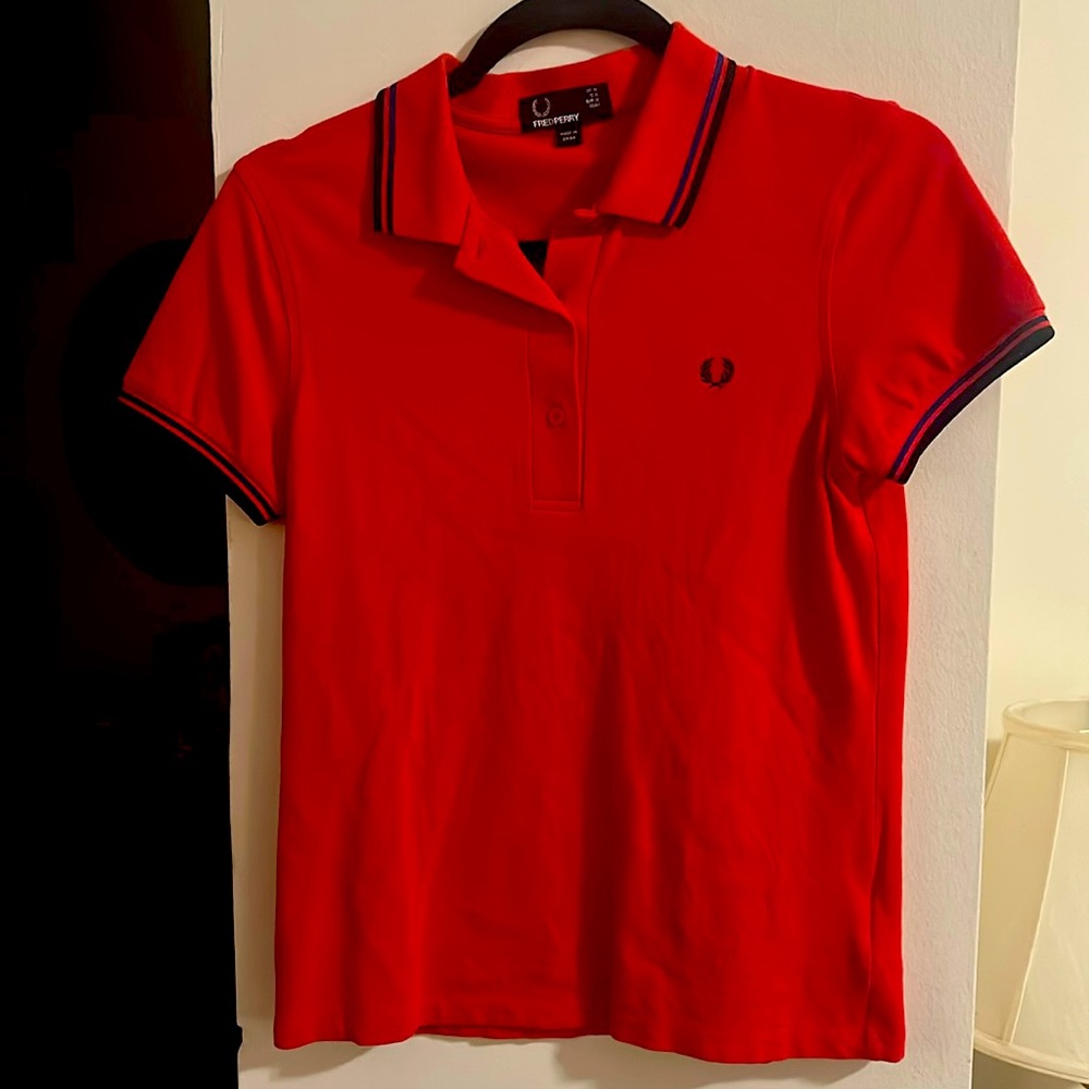 Fred Perry women’s polo red w blue and black trim new without tags.